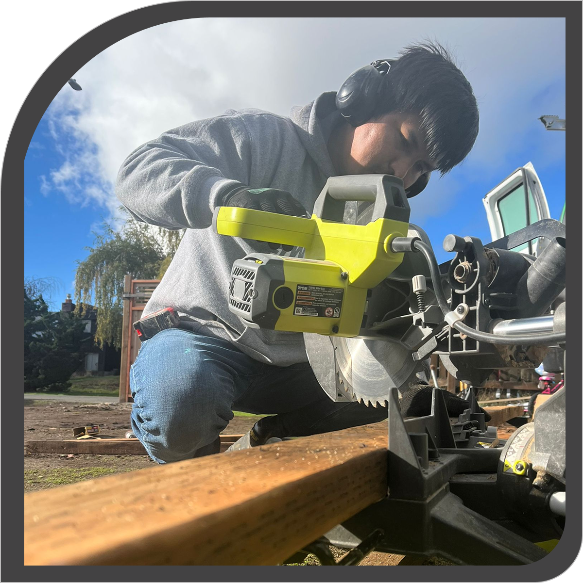 Construction worker using power tools